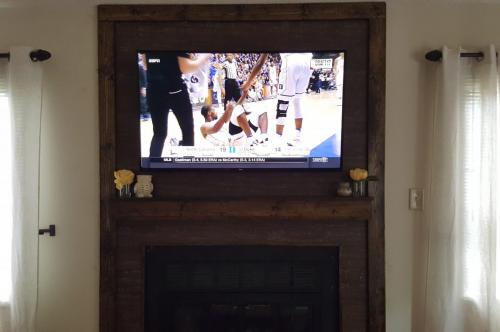 TV Mounted Over Fireplace